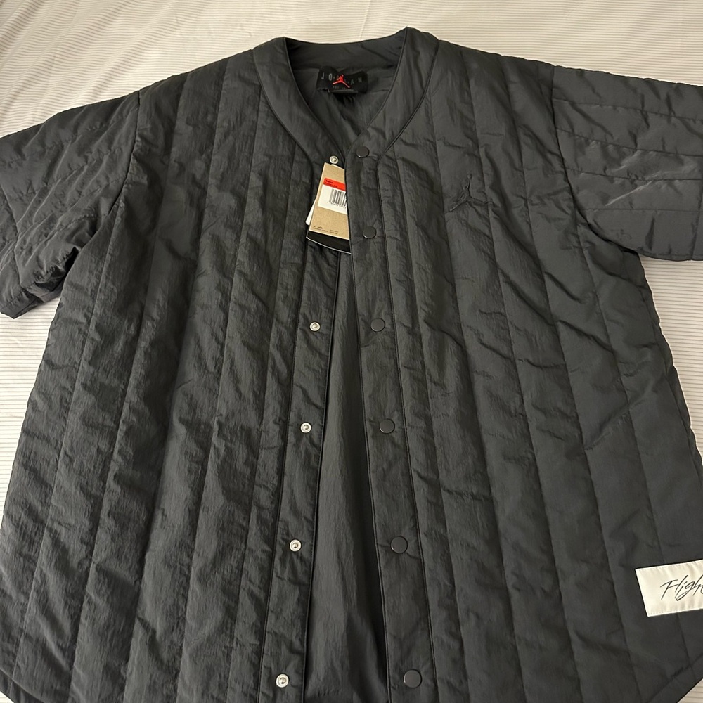 Jordan black lightweight quilted short sleeve jacket